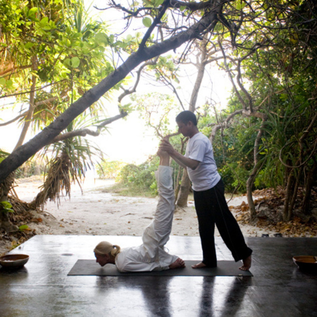 Ami Elsius Receiving Private Yoga Lesson at Amanpulo Resort Philippines